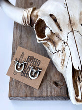Load image into Gallery viewer, Western Style Horseshoe with Longhorn Skull Earrings
