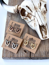 Load image into Gallery viewer, Western Style Horseshoe with Longhorn Skull Earrings
